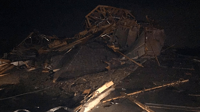 A home damaged in Ovilla, Texas, on Saturday, Dec. 26
